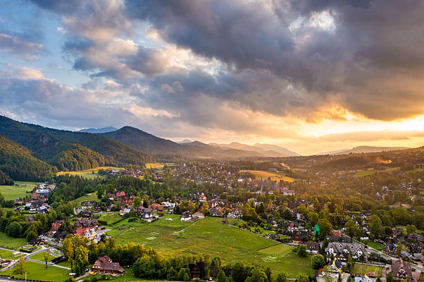 istock Evening Light Over Zakopane Fields and Villages with Forested Hills and Mountains Under Sunset Sky 2223912326