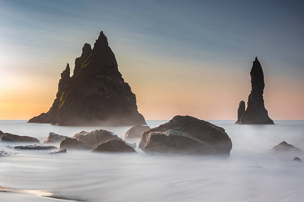istock The dramatic Reynisdrangar basalt sea stacks rising through misty waves in Iceland 2223912805