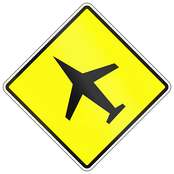 istock Warning road sign in Cambodia - Low flying air craft 2223913213