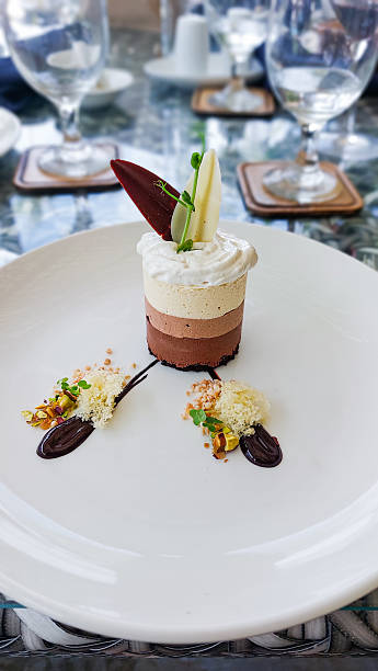 istock Elegant chocolate and vanilla mousse layered cake dessert 2223913544