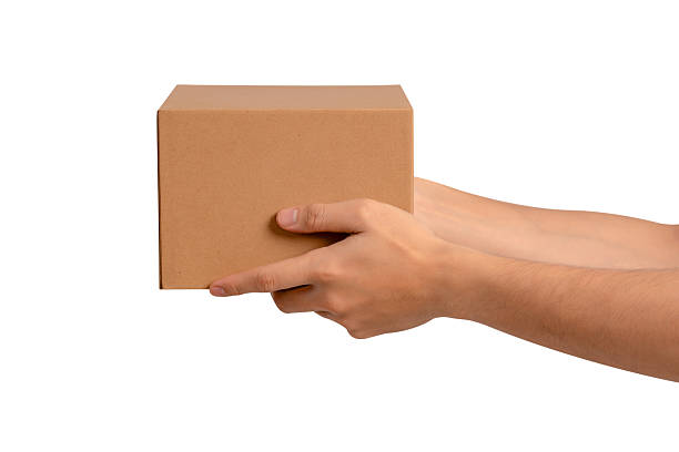 istock Hand holding parcel box isolated on white background. Concept for transportation and delivery. 2223917474