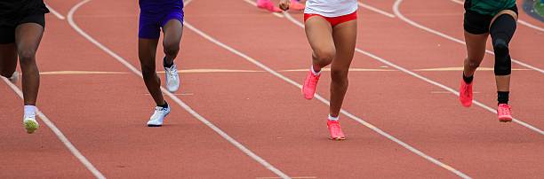 istock Female Runners Sprinting on a Track During Competitive Event 2223921105