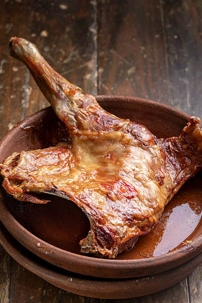 Roasted leg of lamb served in a clay pot