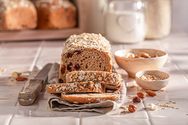 istock Homemade delicacies bread with bran, nuts and raisins. 2223923509