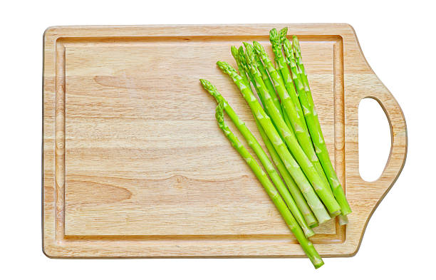 Wooden cutting board with Asparagus