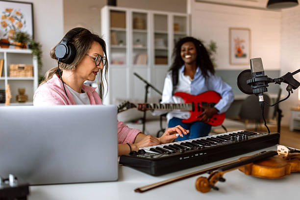 istock Friends having fun performing music together. 2223925794