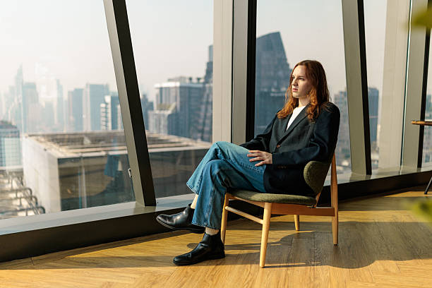 istock Confident man reflecting over Bangkok city view 2223926448