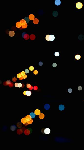 istock Defocused multicolored city lights at night creating abstract bokeh background 2223926595