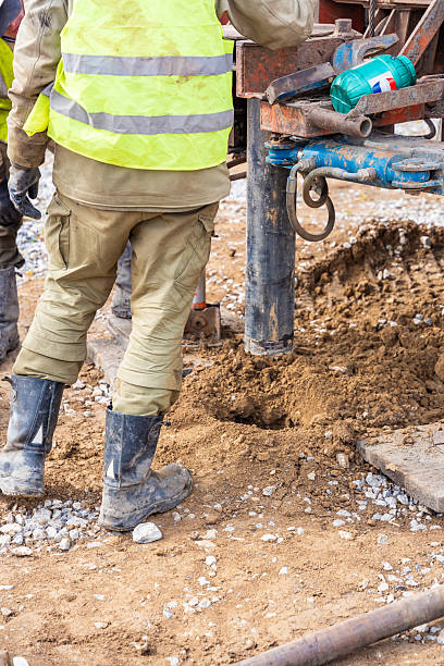 istock Close-up of soil sampling during pile drilling process. Extraction of subsurface material for geotechnical analysis and foundation assessment 2223929219