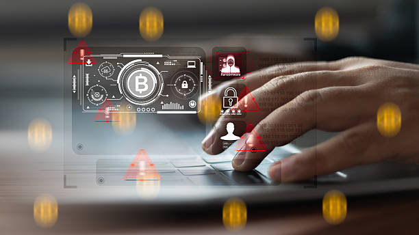istock Hands typing on laptop keyboard with ransomware alert, bitcoin payment interface, and cybersecurity threat, concept of digital crime and cryptocurrency attack. 2223930776