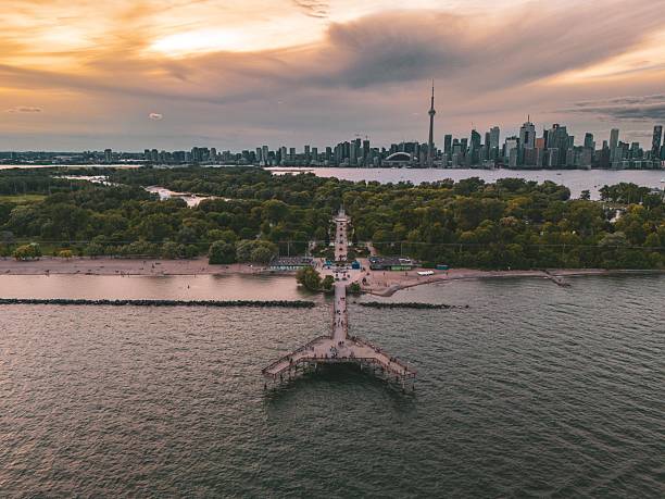 istock Toronto skyline at sunset with pier and greenery. 2223931644