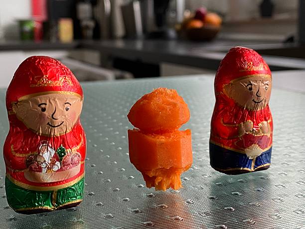 istock Chocolate Santa Clauses together with the Carrot Man 2223933673