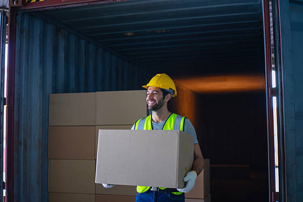 istock Blue collar workers are working at warehouse. 2223935750