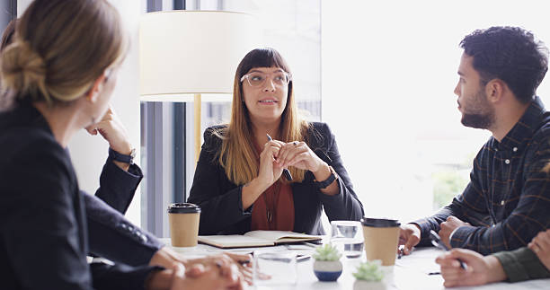 istock Collaboration, meeting and solution with business people in boardroom for discussion or planning. Corporate, problem solving and question with employee group in office for professional workshop 2223935961