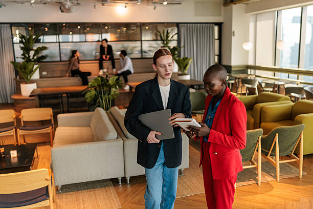 istock Business colleagues engaged in discussion 2223936299