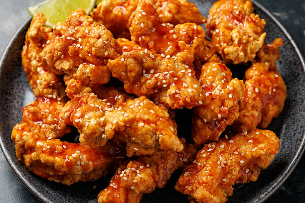 istock Korean fried chicken with spicy sauce and sesame seeds 2223941854