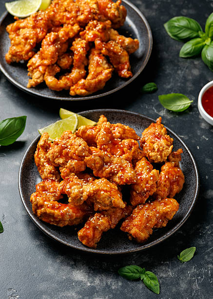 istock Korean fried chicken with spicy sauce and sesame seeds 2223941864