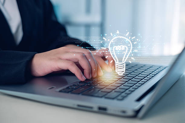 istock Hand of  holding illuminated light bulb, Idea innovation and inspiration concept.  creativity with bulbs that shine glitter, Concept for success. 2223941926