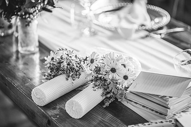 Black and white Wedding candles with floral decorations