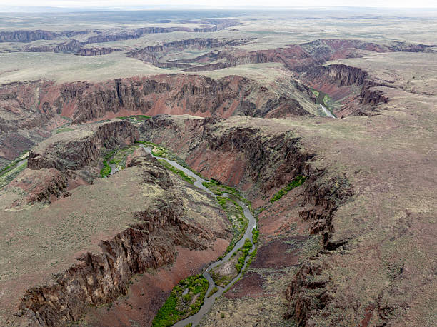 istock Deep meandering canyon with wild Idaho River 2223943150