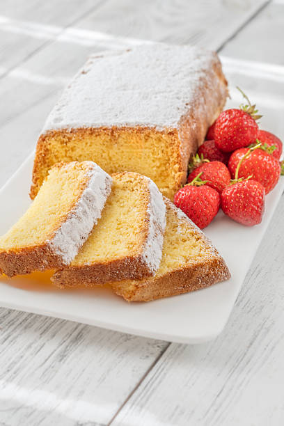 istock Pound Cake Slices with Whipped Cream and Strawberries on Elegant White Plate 2223947321