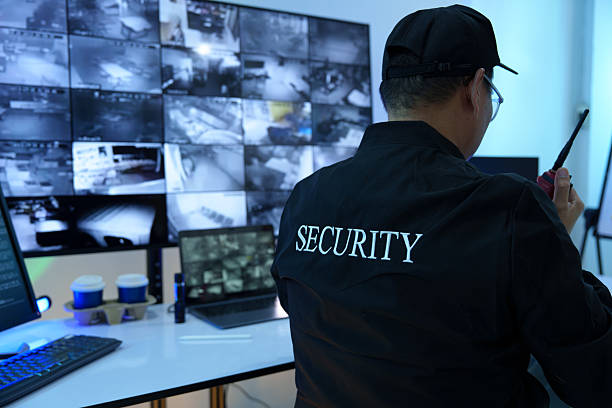 istock Security officers are checking the TV screen of the CCTV system. 2223949613