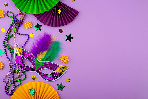 istock Vibrant Mardi Gras background with mask, beads, and festive decorations 2223955109