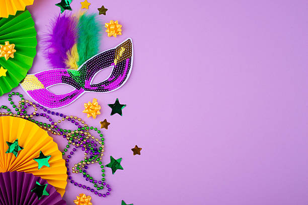 istock Vibrant Mardi Gras background with mask, beads, and festive decorations 2223955121