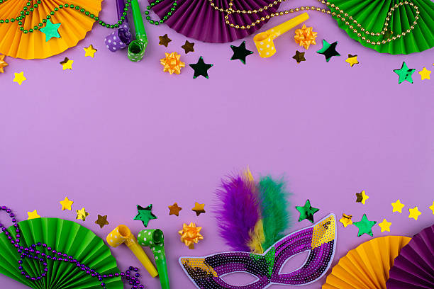 istock Vibrant Mardi Gras background with mask, beads, and festive decorations 2223955125