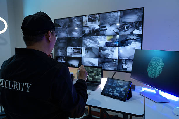 istock Security officers are checking the TV screen of the CCTV system. 2223955651