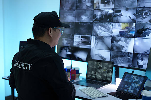 istock Security officers are checking the TV screen of the CCTV system. 2223955668