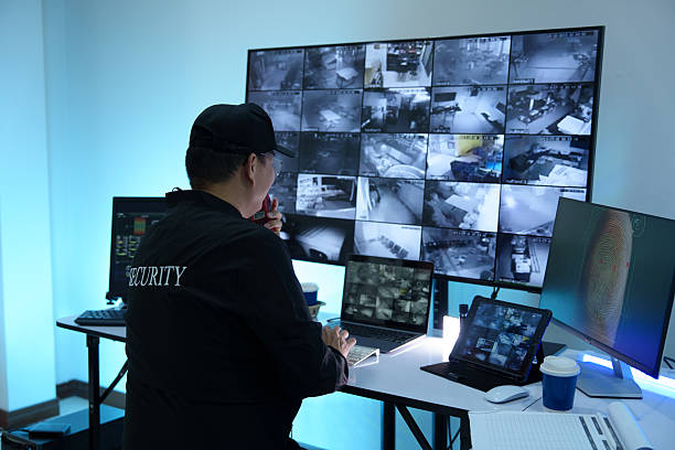 istock Security officers are checking the TV screen of the CCTV system. 2223955672