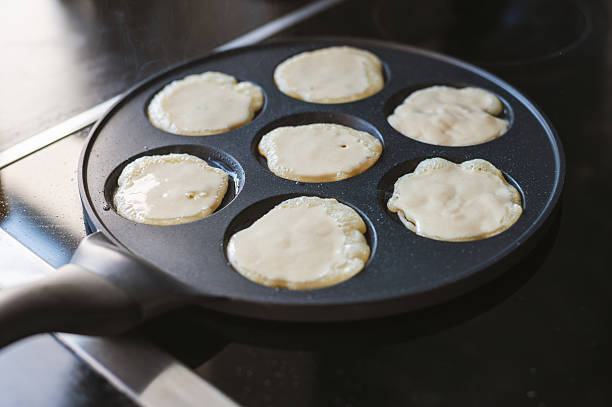 istock Cooking Pancakes on Modern Stove 2223957640