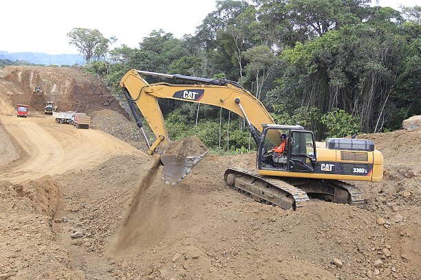 ilheus, bahia, brazil - may 25, 2022: machines working on the construction of a road in southern Bahia