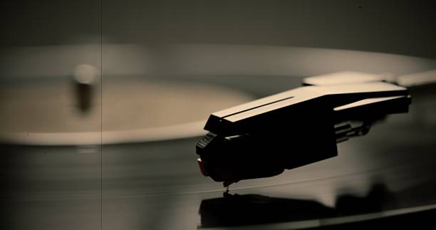 LP. Vinyl record on a turntable. Film damage.