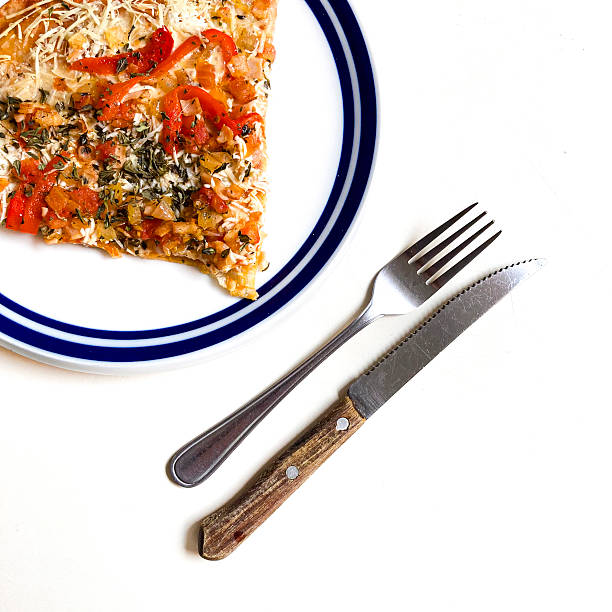 High angle view of slice of pizza made at home in the kitchen  ready to eat for lunch