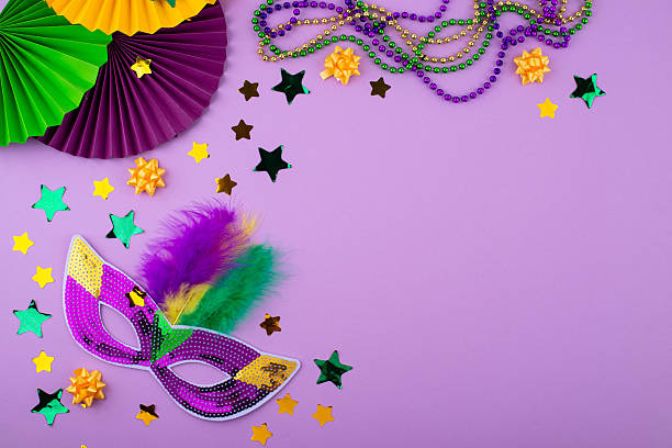istock Vibrant Mardi Gras background with mask, beads, and festive decorations 2223966219