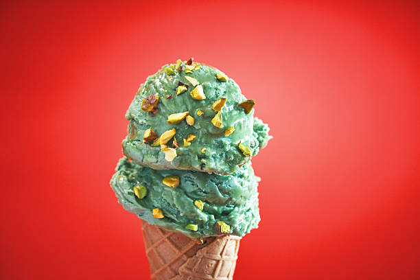 Pistachio Ice Cream with Chopped Pistachios in a Cone