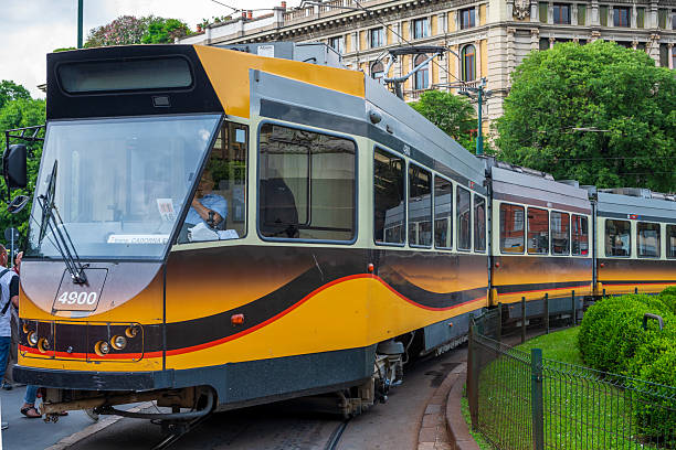 Milan, Lombardy, Italy - June 03, 2025: The 4900 series tram cars of the ATM of Milan, also known as Jumbotram, are a series of three-car articulated tram cars delivered in the 70s