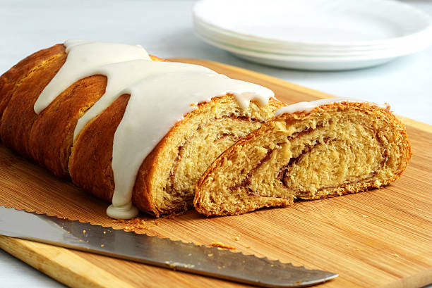 istock closeup of cinnamon roll loaf cake with icing sugar 2223981074