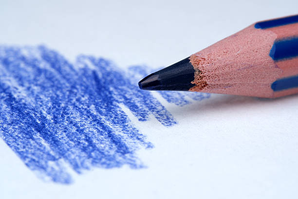 istock Creating art with a blue pencil on textured paper 2223986098