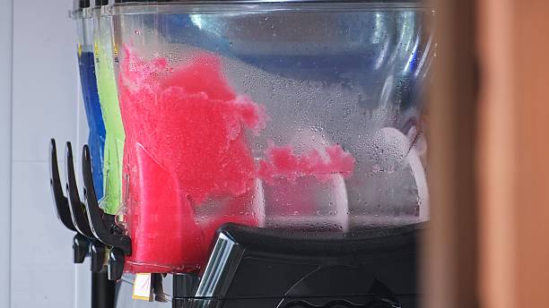 istock Frozen Sweet Slushy Slurpee Drink Mixing Machines 2224013346