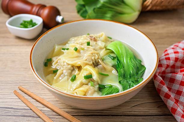 istock Wonton with bok choy Soup in a ceramic bowl 2224015980