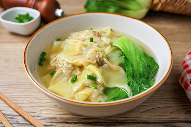 istock Wonton with bok choy Soup in a ceramic bowl 2224015996