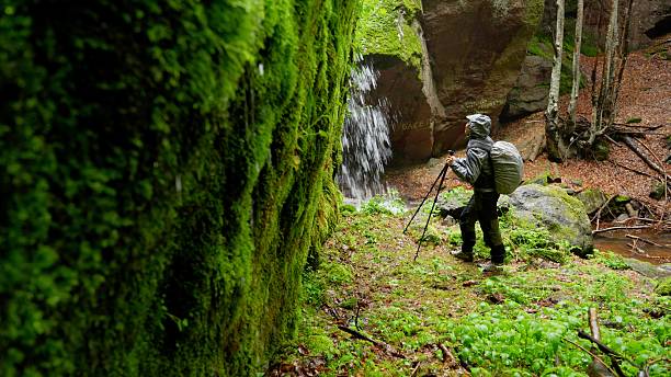 istock Waterfall Hike In Spring. Back To Nature Lifestyle 2224019118