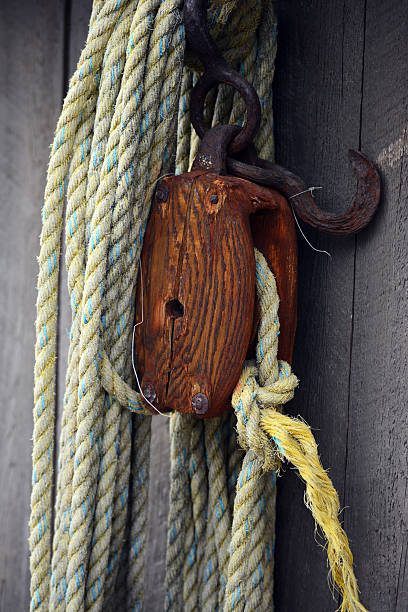 istock Weathered rope on a pulley for marine use 2224020228