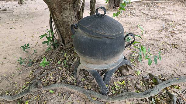 Cast iron pot over bonfire