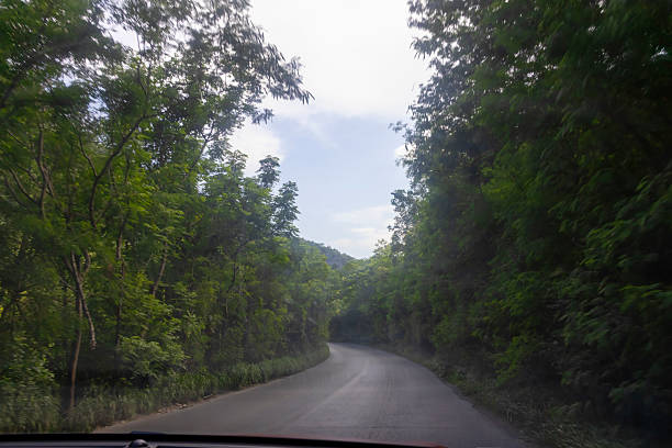 istock Pov driving a car on the road 2224025044