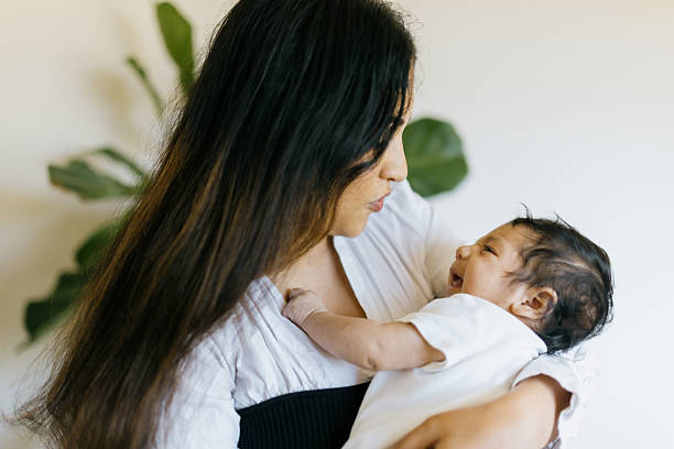 istock Mother Spends Time Bonding With Infant Son 2224033652
