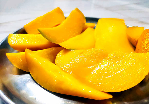 istock Sliced Ripe Mango in Steel Plate 2224038524